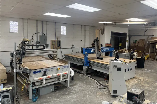 Two CNC routers in the woodshop