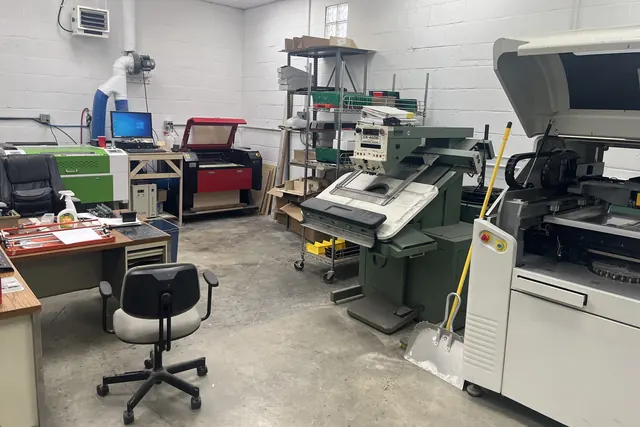 Shop area with laser and electronics production equipment